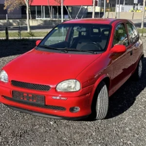Coche de ocasión Opel Corsa B 1.6 GSi 16V color rojo en venta en el concesionario Autoconca en Montblanc, Tarragona.